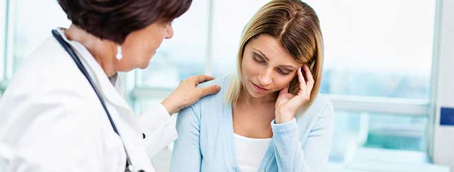 Woman meeting with a doctor over ovarian cancer