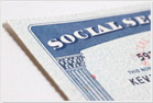 A Warwick, Rhode Island personal injury lawyer shows the corner of a Social Security card.
