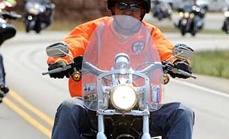 Motorcycle Riding in a yellow shirt