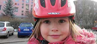 child obeying bicycle helmet safety