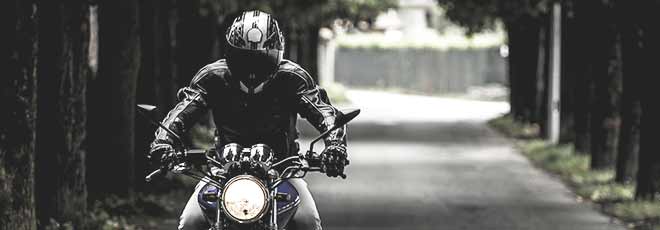 Motorcycle rider driving safely
