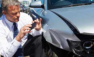 man preserving evidence after a Cranston auto accident