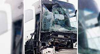 bus damaged in crash and riders that need a RI Bus Accident Lawyer for a bus accident settlement