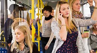 people riding a public bus