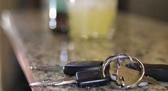 Keys on the table after being taken away from a drunk driver.