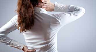 Woman with Back and Neck Injuries caused by a car accident and needing a Back and Neck Lawyer