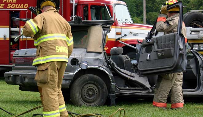 Car Accident due to a hazardous Summer driving factor with Fire and Rescue on site