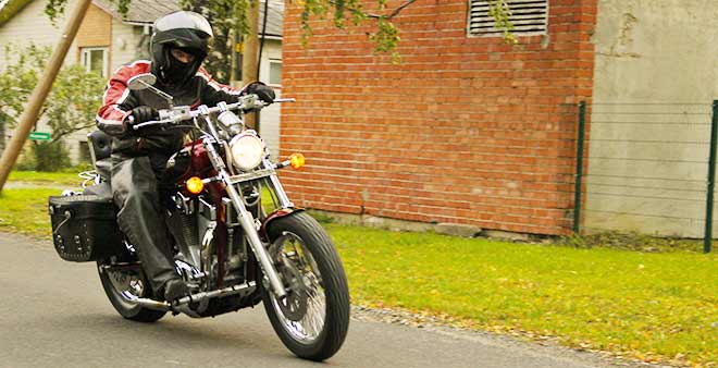 Fall River man riding Motorcycle down the back streets of Fall River Massachusetts