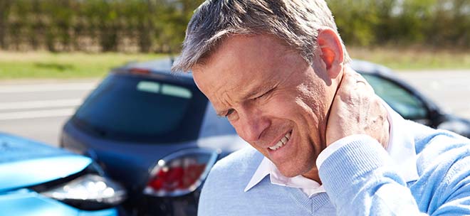 man with whiplash and needing a MA Auto Accident Lawyer