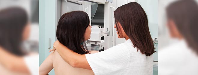 Woman having breast exam to prevent breast cancer