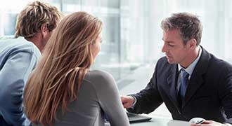 personal injury lawyer meeting couple