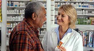 A pharmacist causing a medication error to a patient.
