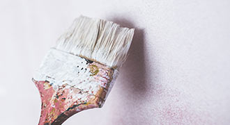 Paint brush covered in lead poisoning paint.