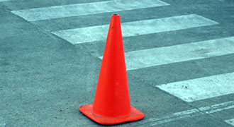 traffic cone warning drivers of the sinkhole