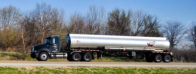 truck driving down Rhode Island road