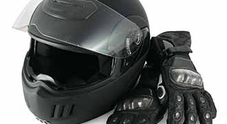 motorcycle helmet and riding gloves to protect a motorcyclist when riding