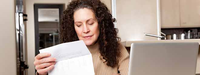 woman with insurance paperwork for her Brockton car accident lawyer