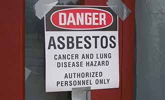 sign warning of asbestos exposure dangers