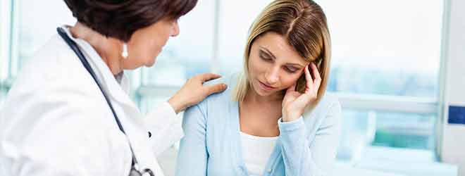 doctor consoling patient on gynecology errors