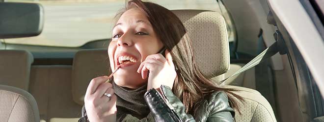 woman having cognitive distractions while driving