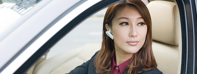to avoid the dangers of texting while driving driver is using bluetooth
