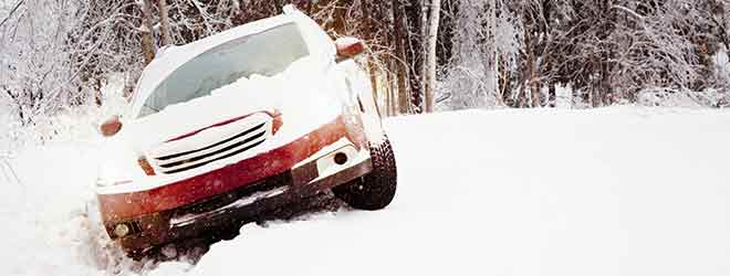 car in ditch that did not have winter tires