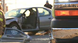 Car crash at pedestrian crossing