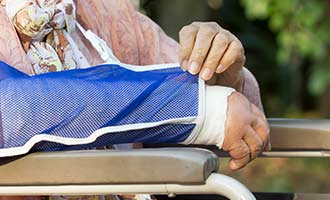 Elderly woman with broken arm