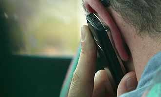 driver making a phone call while driving