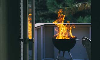 out of control grill fire which is against fire safety