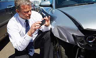 Crash Investigator getting evidence for Fall River Car Accident Attorneys