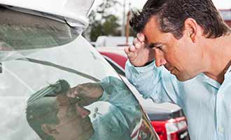 car buyer checking the vehicle identification number