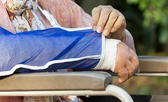 Elderly woman with broken arm who has a pending Nursing Home Abuse Lawsuit