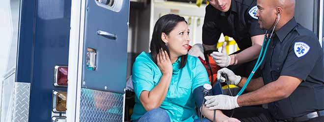 Woman getting Medical Attention After an Accident
