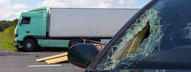 Tractor-Trailer Accident with loose cargo
