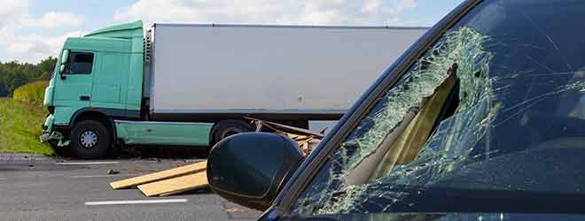 A truck driving after hitting a car in a Massachusetts truck accident.