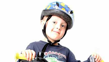 Child in a bicycle helmet