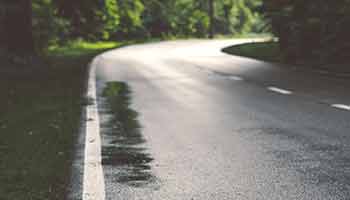 wet road with puddles