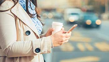 pedestrian looking at phone