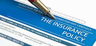 Insurance policy form after a car accident in Wareham Massachusetts.