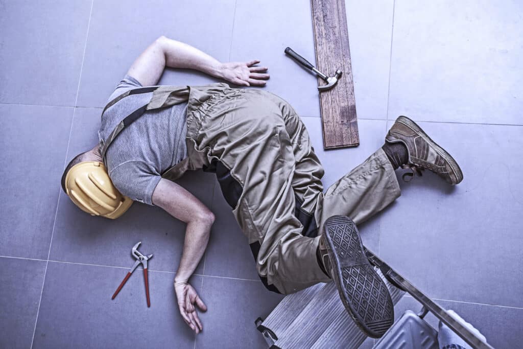 injured worker on floor