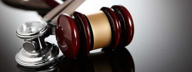 A judges gavel and a stethoscope. 
