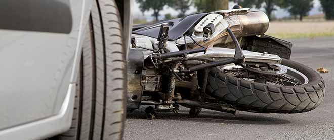 Damaged motorcycle after being involved in an accident