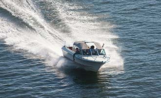 Boat speeding in Narragansett Bay off the coast of Rhode Island