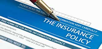 An insurance policy form being filled out. 