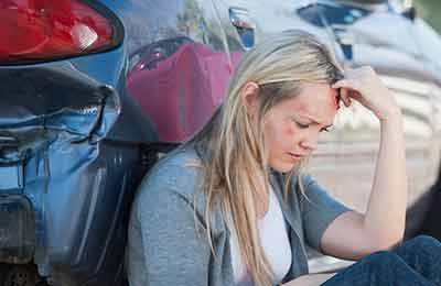 woman with facial injuries after car accident
