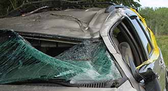 Defective automobile with a crushed roof in Rhode island.