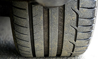 Defective tires on a defective automobile in Rhode Island.