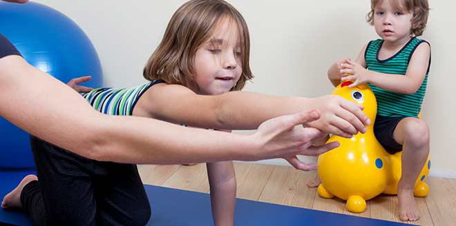 A child doing exercise lessons. 