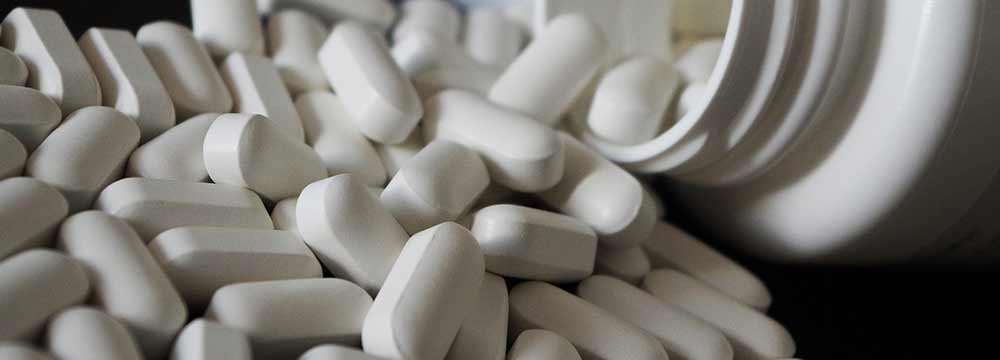 A spilled over bottle of Provigil pills.  